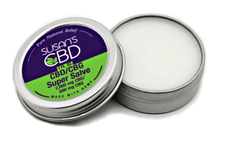 Susan’s CBD 1 oz CBD/CBG Super Salve tin, 2,000 mg CBD and 500 mg CBG, open to show the balm